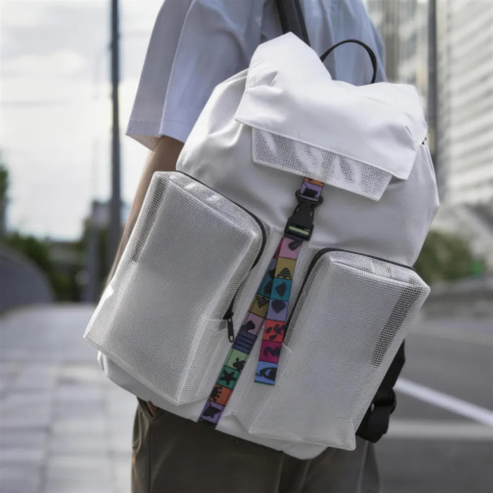 Person wearing custom branded RPET sports backpack, sustainable school and sports merch by Wumble Merch Australia