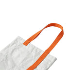 Close up of crinkled Tyvek paper texture and cotton lining on tote bag, eco corporate gift Australia by Wumble Merch