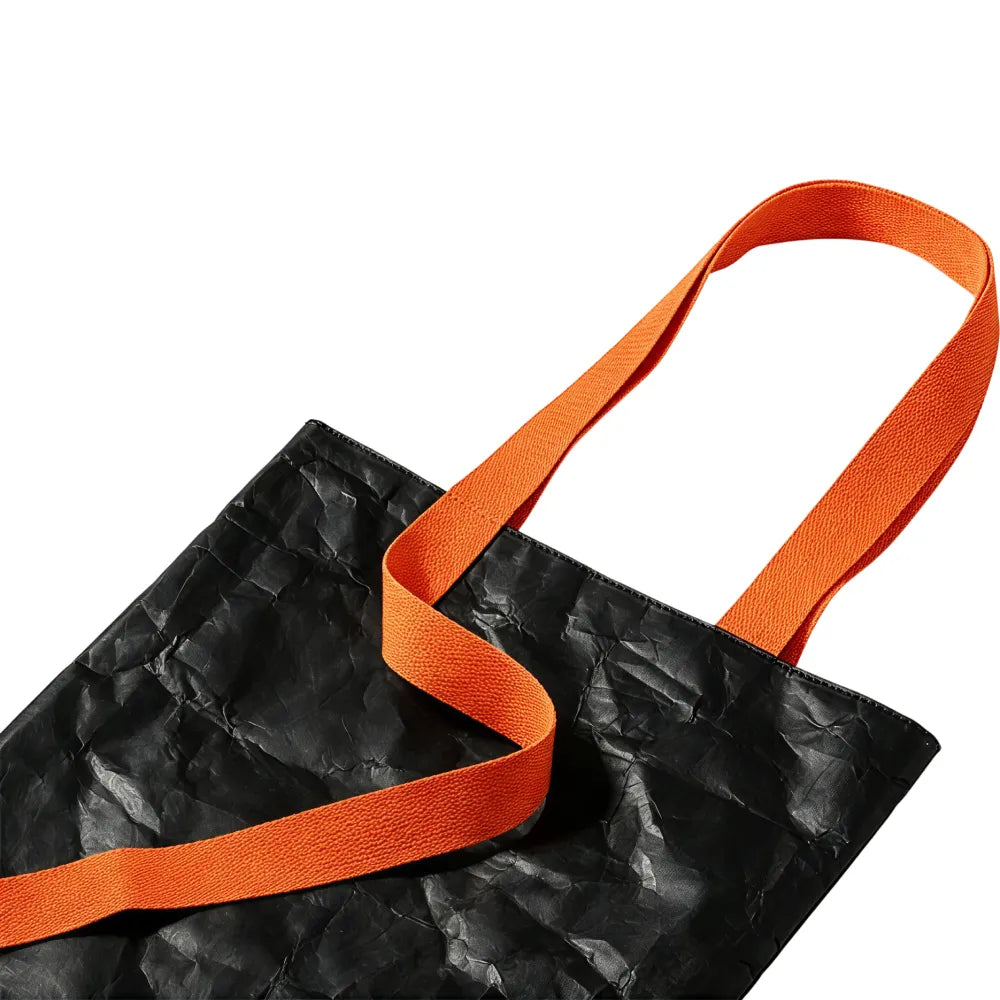 Close up of crinkled Tyvek paper texture on tote bag, sustainable bulk merch Australia by Wumble Merch