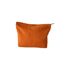 Custom branded zip pouch in burnt orange, waterproof nylon, bulk merch Australia by Wumble